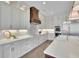 Bright kitchen with white cabinets, quartz countertops, and updated appliances at 103 Candler Loop, Acworth, GA 30101