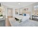Elegant main bedroom with a tufted headboard, bench, and stylish area rug at 103 Candler Loop, Acworth, GA 30101