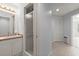 Bathroom area features a vanity with ample storage and a glass door shower at 1363 Brentwood Ln, Marietta, GA 30062