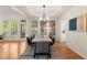 Elegant dining room featuring hardwood floors, stylish decor and natural light at 1363 Brentwood Ln, Marietta, GA 30062