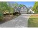 Charming two-story home featuring a long driveway and well-manicured landscaping at 1363 Brentwood Ln, Marietta, GA 30062