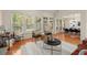 Open living room with natural light pouring in from the large windows at 1363 Brentwood Ln, Marietta, GA 30062