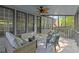 Cozy screened porch with comfortable seating and lots of natural light at 1363 Brentwood Ln, Marietta, GA 30062