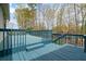 Large back deck perfect for outdoor entertaining with beautiful landscaping at 1612 Sky Crest Dr, Lithia Springs, GA 30122