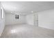 Basement features recessed lighting, neutral carpet, and a paneled accent wall at 1612 Sky Crest Dr, Lithia Springs, GA 30122