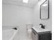 Updated bathroom features a modern vanity, sleek fixtures, and a luxurious soaking tub at 1612 Sky Crest Dr, Lithia Springs, GA 30122
