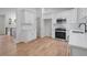 Well-lit kitchen boasting white cabinets, subway tile, and stainless steel appliances at 1612 Sky Crest Dr, Lithia Springs, GA 30122