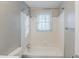 Clean bathroom featuring a tub and shower combination with tiled walls at 2070 Perkerson Sw Rd, Atlanta, GA 30310