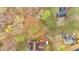 Aerial view of property amidst lush greenery, showcasing its spacious surroundings at 3640 Silver Leaf Sw Ln, Marietta, GA 30008