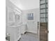 Updated bathroom with double vanity, stylish fixtures, and a modern tiled shower at 3640 Silver Leaf Sw Ln, Marietta, GA 30008