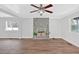 Bright living room with hardwood floors and a charming fireplace feature wall at 3640 Silver Leaf Sw Ln, Marietta, GA 30008