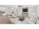 Open-concept living room with hardwood floors, modern furnishings, and a gray fireplace at 3640 Silver Leaf Sw Ln, Marietta, GA 30008