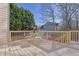 Charming outdoor deck with patio furniture, perfect for enjoying the serene backyard view at 917 Redstone Trl, Dacula, GA 30019