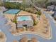 Aerial view of neighborhood amenities including pool, playground, and tennis courts at 11395 Crestview Ter, Johns Creek, GA 30024