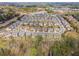 Expansive aerial view showcasing the neighborhood's layout and residential homes at 11395 Crestview Ter, Johns Creek, GA 30024