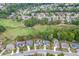 A birds eye view shows this home and other neighborhood properties backing onto the golf course at 1718 Autumn Sage Dr, Dacula, GA 30019