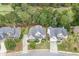 An aerial view displays this property's beautiful landscaping and surrounding homes at 1718 Autumn Sage Dr, Dacula, GA 30019