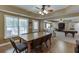 Spacious basement with game and seating areas, plus a dining area with natural light at 1718 Autumn Sage Dr, Dacula, GA 30019