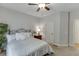 This bedroom is brightly lit with natural light and carpeted flooring at 1718 Autumn Sage Dr, Dacula, GA 30019