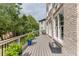 Spacious deck with a view of the backyard and lush greenery, perfect for outdoor entertaining at 1718 Autumn Sage Dr, Dacula, GA 30019