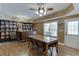 Basement dining area featuring a built-in bar and a large storage shelf for games at 1718 Autumn Sage Dr, Dacula, GA 30019