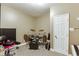 Finished basement music room with a drum set, keyboard, and ample space at 1718 Autumn Sage Dr, Dacula, GA 30019