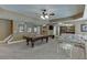 Spacious recreation room featuring a pool table, comfortable seating, and a kitchenette at 1718 Autumn Sage Dr, Dacula, GA 30019