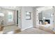 Bright foyer with modern decor, hardwood floors, and a view of the adjacent office space at 4210 Provenance Trl, Cumming, GA 30028