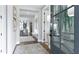 Bright and inviting foyer with hardwood floors and elegant decor at 4210 Provenance Trl, Cumming, GA 30028
