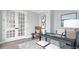 Office space with French doors, desk, and artwork perfect for work or study at 4210 Provenance Trl, Cumming, GA 30028
