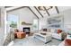 Cozy living room with a fireplace, high ceilings, and comfortable seating at 4210 Provenance Trl, Cumming, GA 30028