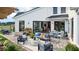 Back patio featuring outdoor furniture and a view of the lawn and field at 4210 Provenance Trl, Cumming, GA 30028