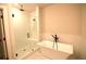 Modern bathroom showcasing a separate shower and soaking tub at 502 Clover Ln, Alpharetta, GA 30009