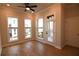 Bright bedroom featuring hardwood floors, natural light, and neutral walls at 502 Clover Ln, Alpharetta, GA 30009
