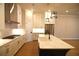 Stylish kitchen features an island with quartz countertops and stainless appliances at 502 Clover Ln, Alpharetta, GA 30009