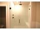 Modern shower with glass door and black fixtures at 502 Clover Ln, Alpharetta, GA 30009