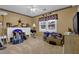 A bedroom with light brown carpet, a ceiling fan and red and white decorative border at 524 Lambeth Dr, Hiram, GA 30141