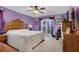 Cozy primary bedroom with a ceiling fan and natural light from a window at 524 Lambeth Dr, Hiram, GA 30141