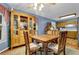 Open-concept kitchen and dining area with adjacent, modern appliances at 524 Lambeth Dr, Hiram, GA 30141