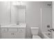 Bathroom with modern vanity, single sink and tub-shower combination at 363 Riverwood Pass, Dallas, GA 30157