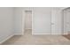 Spacious, neutral-toned bedroom with carpet and walk-in closet at 363 Riverwood Pass, Dallas, GA 30157