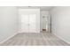 Bright bedroom with neutral carpet, double closets, and an en-suite bathroom at 363 Riverwood Pass, Dallas, GA 30157