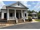Elegant clubhouse featuring stately columns, a gazebo, and professional landscaping at 363 Riverwood Pass, Dallas, GA 30157
