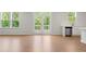 Open-concept living space with access to the outdoors at 363 Riverwood Pass, Dallas, GA 30157