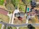 Aerial view of the property showing the house, pool, and well-manicured backyard space at 385 Jayne Ellen Way, Alpharetta, GA 30009