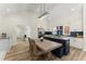 Bright eat-in kitchen with stainless steel appliances, white cabinets, and a navy blue island at 385 Jayne Ellen Way, Alpharetta, GA 30009