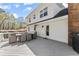 Outdoor patio with a dining set, accessible from the house, perfect for entertaining or outdoor dining at 385 Jayne Ellen Way, Alpharetta, GA 30009