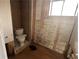 Bathroom with damage and exposed walls; a project ready for renovation at 3025 Mckenzie Rd, Atlanta, GA 30344