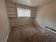Bedroom featuring carpet, built-in shelves and neutral paint, ready for your personal touches at 3025 Mckenzie Rd, Atlanta, GA 30344