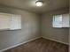 Comfortable bedroom with carpeted floors and natural light; perfect for relaxation at 3025 Mckenzie Rd, Atlanta, GA 30344